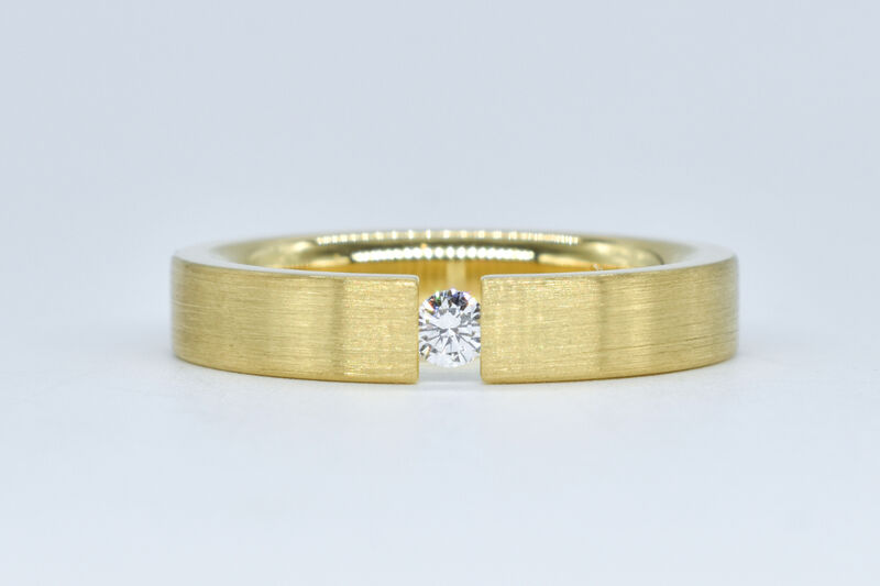 Spann-Ring 18 Kt GG Brillant