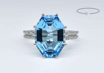 Ring 18 K blue topaze 